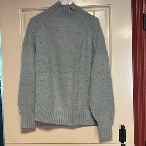 Everlane. Medium. Blue/green turtleneck sweater with polka dot details.